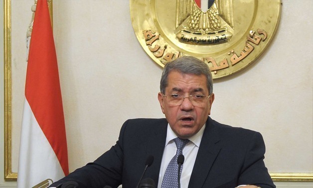 FILE - Minister of Finance Amr El-Garhy 
