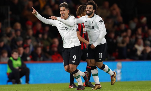 Premier League - AFC Bournemouth vs Liverpool - Vitality Stadium, Bournemouth, Britain - December 17, 2017 Liverpool's Roberto Firmino celebrates scoring their fourth goal with Mohamed Salah Action Images via Reuters/Paul Childs