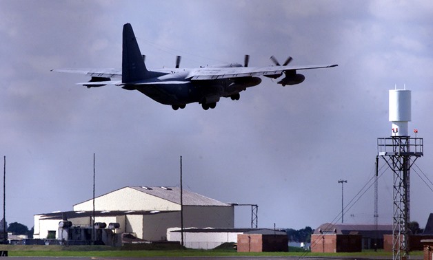 FILE PHOTO: A U.S. Hurricane transport plane takes off from RAF Mildenhall, Suffolk, England, September 15, 2001. REUTERS/Stephen Hird/File Photo