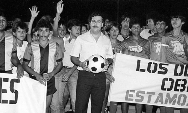 Pablo Escobar holding a football – Courtesy of thesefootballtimes.co