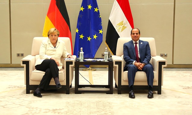 Egyptian President Abdel Fatah al-Sisi (R) and German Chancellor Angela Merkel (L) - press photo