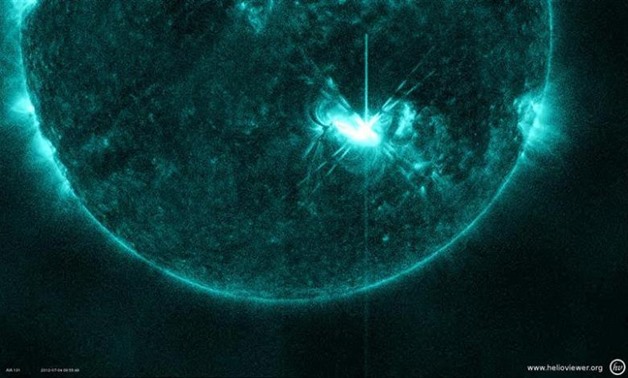 This image, captured by the Solar Dynamics Observatory, shows the M5.3 class solar flare that peaked on July 4, 2012, at 5:55 AM EDT, released July 5, 2012 – REUTERS/NASA/SDO/AIA/Helioviewer/Handout