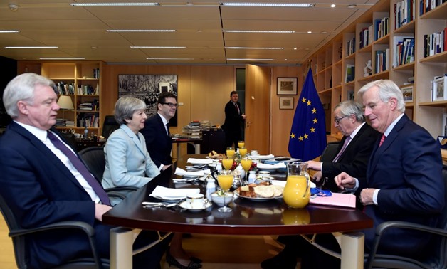 
(L to R) Britain's Secretary of State for Exiting the European Union David Davis, Britain's Prime Minister Theresa May, European Commission President Jean-Claude Juncker and European Union's chief Brexit negotiator Michel Barnier meet at the European Co