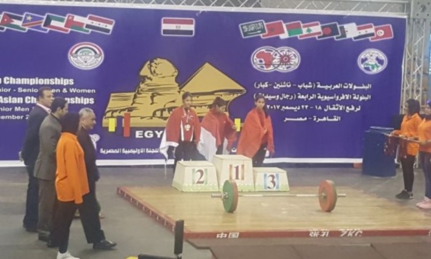 FILE –Egyptian weightlifter Heba Saleh on the podium 