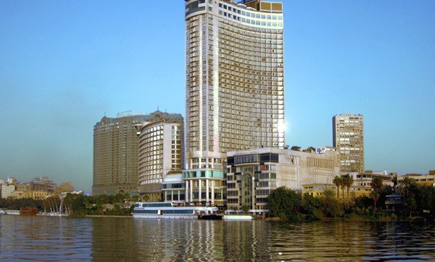 The Grand Nile Tower Hotel (2003) overlooking the river at Cairo, Egypt, was part of the Hyatt chain until 2011. A revolving restaurant is on the 40th floor., Jan. 23, 2013 - Flickr/David Stanley