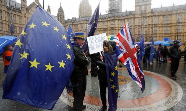 Anti Brexit protesters demonstrate outside the Houses of Parliament in London, Britain December 11, 2017. REUTERS/Peter Nicholls