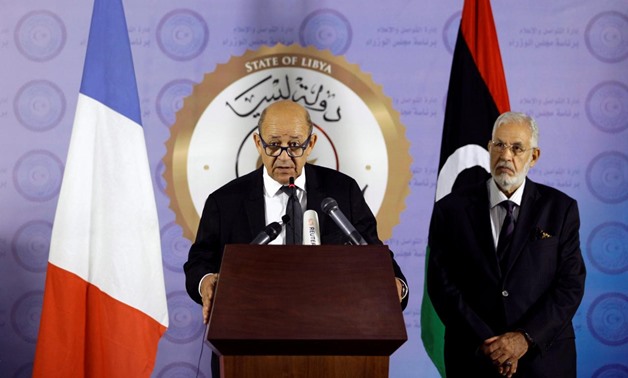 French Foreign Affairs Minister Jean-Yves Le Drian (L) speaks during a news conference at the headquarters of the prime minister's office in Tripoli, Libya September 4, 2017 . REUTERS/Ismail Zitouny.