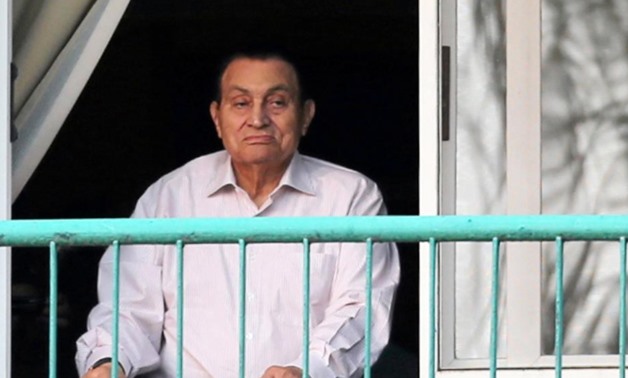 FILE- Ousted Egyptian president Hosni Mubarak looks towards his supporters during celebrations of the 43rd anniversary of the 1973 Arab-Israeli war, at Maadi military hospital on the outskirts of Cairo, October 2016 -  REUTERS/Mohamed Abd El Ghany