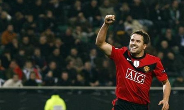 Michael Owen of Manchester United celebrates after scoring during the Champions League match against VfL Wolfsburg in Wolfsburg December 8, 2009 -
 REUTERS/Christian Charisius