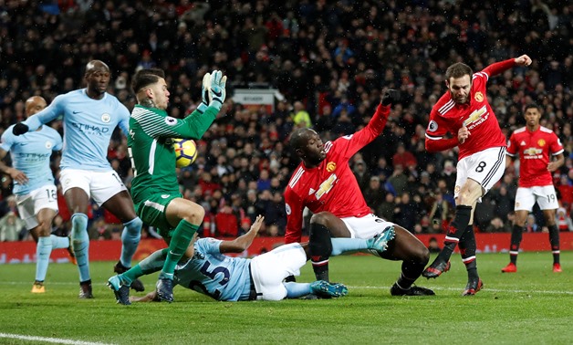 Soccer Football - Premier League - Manchester United vs Manchester City - Old Trafford, Manchester, Britain - December 10, 2017 Manchester United's Juan Mata has a shot saved by Manchester City's Ederson Action Images   - Reuters/Carl Recine