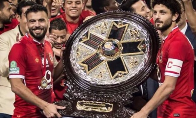 File - Hossam Ghaly and Emad Moteab holding the Egyptian Premier League shield