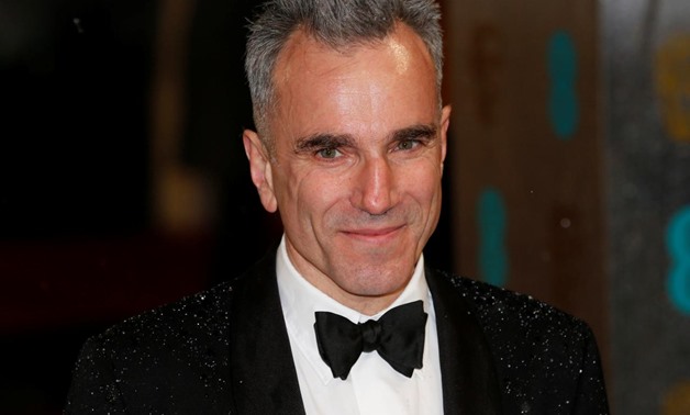 Actor Daniel Day-Lewis poses as he arrives for the British Academy of Film and Arts (BAFTA) awards ceremony at the Royal Opera House in London, Britain, February 10, 2013 - REUTERS/Suzanne Plunkett/File Photo