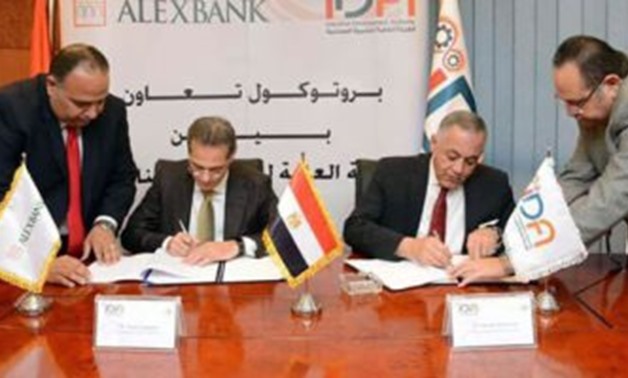FILE – Chief Executive Officer, Managing Director of Alexandria Bank Dante Campioni sign a new protocol on cooperation with Head of IDA, Ahmed Abd el-razek