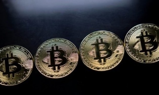 The eye-watering surge in Bitcoin has come with several warnings that a bubble is about to burst - AFP