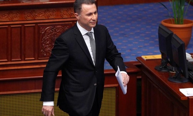 FILE PHOTO: Former Macedonian Prime Minister Nikola Gruevski walks to his seat in parliament after his address to the deputies in Skopje, Macedonia June 1, Reuters