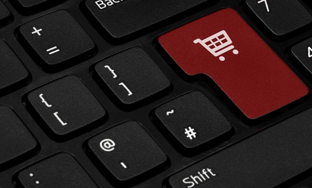 Online shopping - A red button for purchases on the keyboard - CC0 Public Domain 