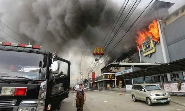 The fire tore through a shopping mall in Davao, southern Philippines - AFP