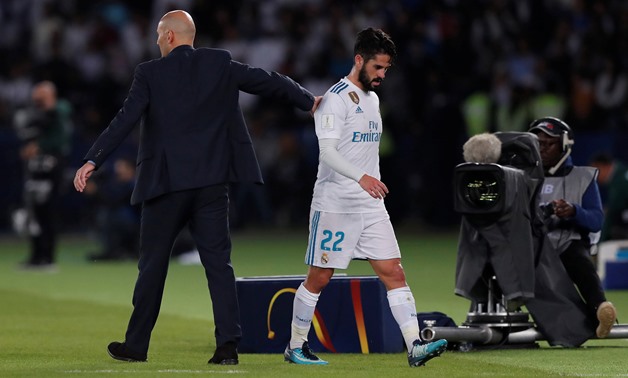 Soccer Football – FIFA Club World Cup final – Real Madrid vs. Gremio FBPA – Zayed Sports City Stadium, Abu Dhabi, United Arab Emirates – December 16, 2017, Real Madrid’s Isco is substituted off while Real Madrid coach Zinedine Zidane looks on. REUTERS/Amr