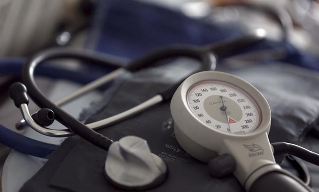 FILE- A photo illustration shows a stethoscope and blood-pressure machine of a French general practitioner displayed in a doctor's office in Bordeaux January 7, 2015. REUTERS/Regis Duvignau