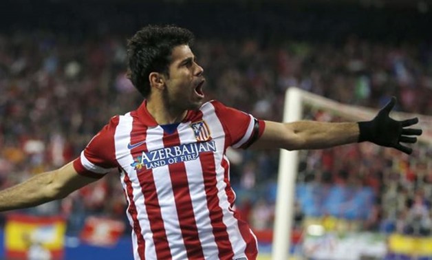 Diego Costa celebrates one of his goals with Atletico Madrid in 2014, Reuters