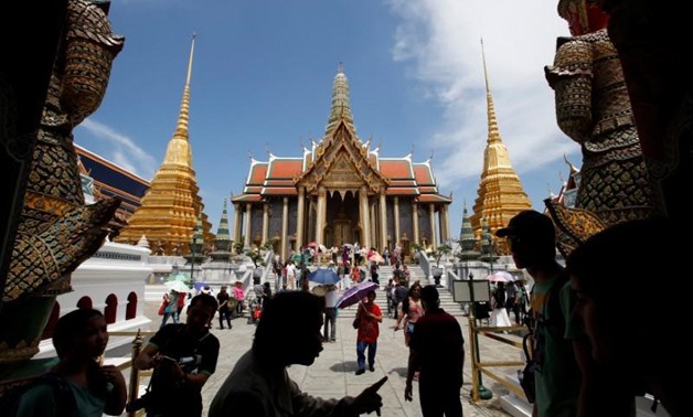 FILE PHOTO - Tourists visit the Grand Palace in Bangkok May 24, 2014. REUTERS/Erik De Castro/File Photo. “