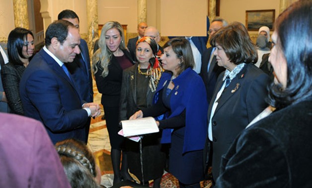 Egyptian President Abdel Fatah Al-Sisi, Maya Morsy along with the National Council of Women Members - Egypt Today