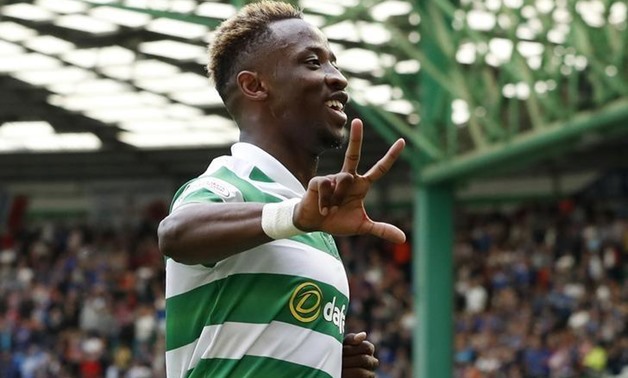 Britain Soccer Football - Celtic v Rangers - Scottish Premiership - Celtic Park – Oct, 9, 2019, Celtic's Moussa Dembele celebrates scoring their fourth goal and completing his hat-trick - Reuters / Russell Cheyne