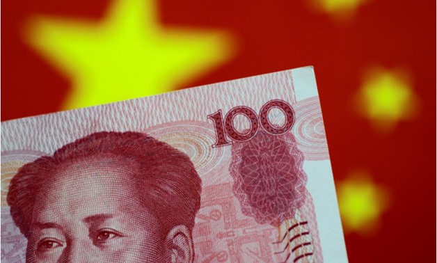 A China yuan note is seen in this illustration photo May 31, 2017 - REUTERS/Thomas White/Illustration/File Photo