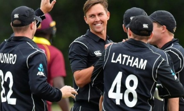 New Zealand's Trent Boult (C) celebrates with teammates after bowling out West Indies batsman Chadwick Walton during their third ODI match, at Hagley Oval in Christchurch, on December 26, 2017 -  AFP 