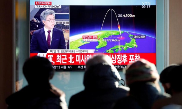People watch a television broadcast of a news report on North Korea firing what appeared to be an intercontinental ballistic missile (ICBM) that landed close to Japan, in Seoul, South Korea, November 29, 2017 -  REUTERS/Kim Hong-Ji