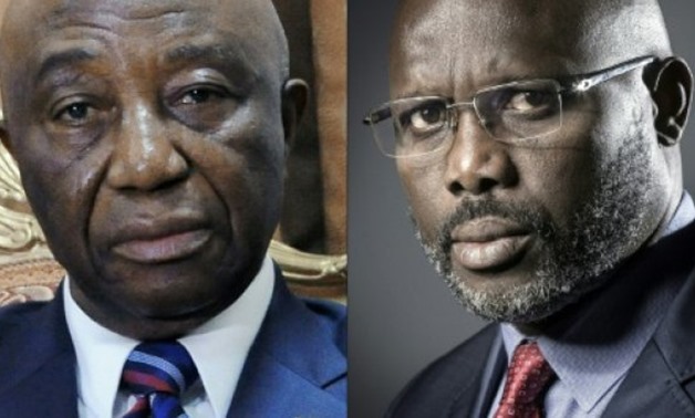 © AFP | Liberia Vice President Joseph Nyumah Boakai (L) and former football player George Weah are vying for the presidency following Tuesday's run-off vote
