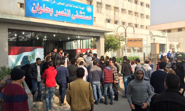 Dozens of citizens rush to Al-Nasr hospital in Helwan to denote blood for victims of Martyr Mary church terrorist attack - file