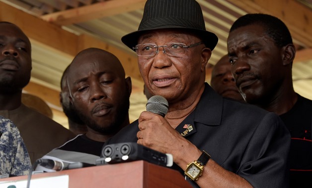 Outgoing Liberian Vice President Joseph Boakai (C) delivers a statement to media representatives in Monrovia on December 29, 2017, after he was defeated by former footballer George Weah in presidential elections-  AFP.