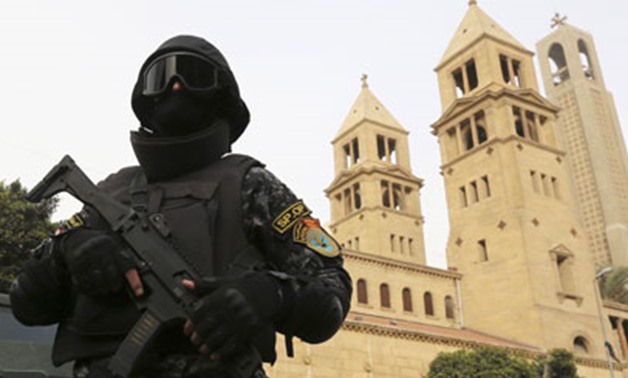 FILE – Security Forces in front of a church in Egypt