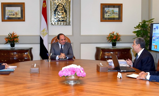 President Abdel Fatah al-Sisi (M) heads a meeting with Mostafa Madbouly (L), acting Prime Minister, and Mohamed Shaker (TR), Minister of Electricity and Renewable Energy, in the presence of Presidential Spokesperson, Bassam Rady (BR) – Courtesy of the Pre
