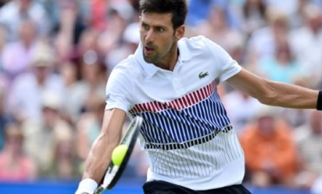 © AFP/File / by David HARDING | Novak Djokovic, the champion in Doha for the past two years, has pulled out of the Qatar Open because of continuing problems with a niggling elbow injury
