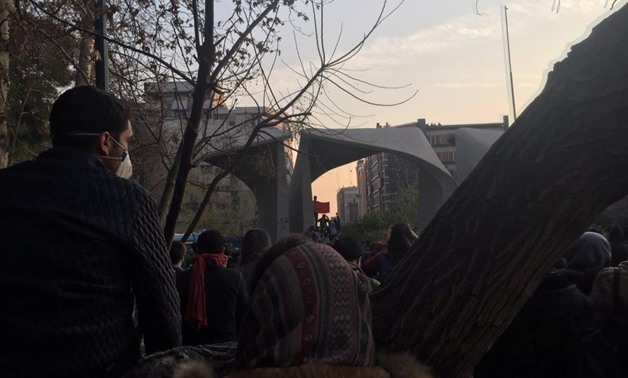 People protest near the university of Tehran, Iran December 30, 2017 in this picture obtained from social media. TWITTER/@kasra_nouri/via REUTERS. “

