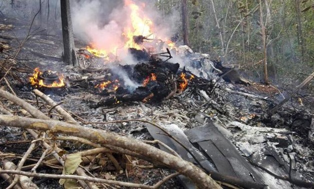 Smoke and fire seen at the site where a plane crashed in the mountainous area of Punta Islita, in the province of Guanacaste, in Costa Rica December 31, 2017 in this picture obtained from social media. Ministerio de Seguridad Publica de Costa Rica/via REU