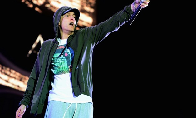 Eminem, shown performing at a 2014 concert, will be a headliner at southern California's Coachella festival in April