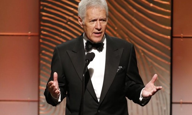 FILE PHOTO: Jeopardy television game show host Alex Trebek speaks on stage during the 40th annual Daytime Emmy Awards in Beverly Hills, California June 16, 2013. REUTERS/Danny Moloshok
