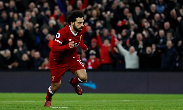 Soccer Football - Premier League - Liverpool vs Leicester City - Anfield, Liverpool, Britain - December 30, 2017 Liverpool's Mohamed Salah celebrates scoring their first goal REUTERS