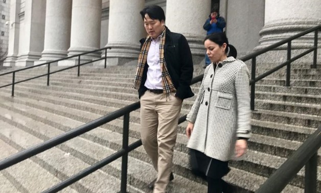 FILE PHOTO: Joo Hyun Bahn (L), a nephew of former U.N. Secretary-General Ban Ki-moon, leaves a hearing in the federal court in Manhattan with his lawyer, Julia Gatto in New York City, New York, U.S. January 20, 2017. REUTERS/Nate Raymond