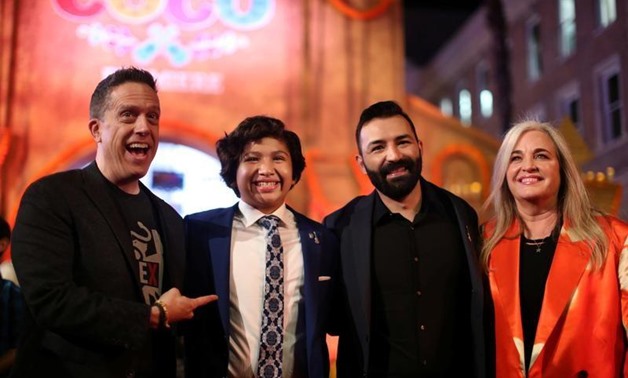 (L-R) Director Lee Unkrich, Anthony Gonzalez, who plays the voice of Miguel, co-director/screenwriter Adrian Molina and producer Darla K. Anderson attends Disney-Pixar's U.S. premiere of "Coco" in the Hollywood section of Los Angeles, California, U.S. Nov