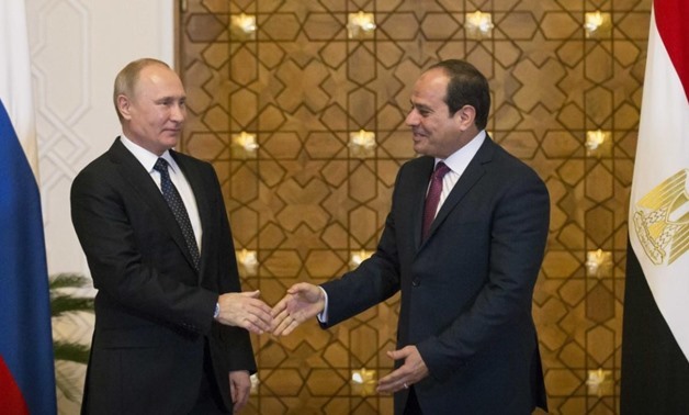 FILE- Egyptian President Abdel Fatah al-Sisi and Russian counterpart Vladimir Putin in Cairo – Reuters