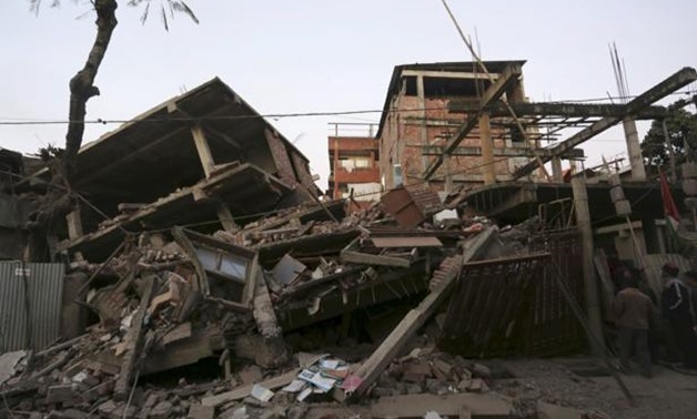 Damaged residential houses after an earthquake in Imphal on Monday. Photo: Reuters
