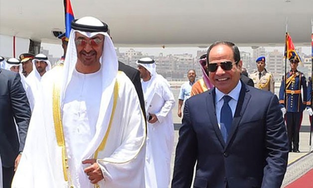 Abu Dhabi's Crown Prince Sheikh Mohamed bin Zayed with Egyptian President Abdel Fattah El-Sisi at Cairo Airport in November 2016 – Egyptian Presidency/File photo