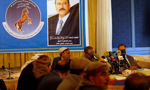 Members of the General People's Congress party, once headed by Yemen's slain former president Ali Abdullah Saleh (pictured in poster), attend a meeting of the party's leadership in Sanaa, Yemen January 7, 2018. REUTERS/Khaled Abdullah