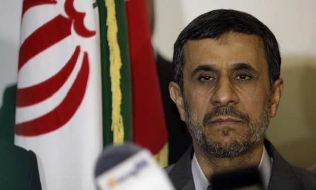 Mahmoud Ahmadinejad visits Imam Ali shrine in Najaf, Iraq, July 19, 2013. REUTERS/Karim Kadim/Pool
