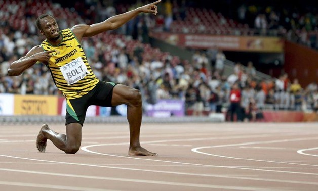 Usain Bolt of Jamaica reacts after winning the men's 200m final during the 15th IAAF World Championships at the National Stadium in Beijing, China, August 27, 2015 - REUTERS/Lucy Nicholson
