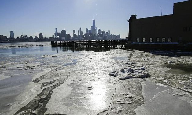 Ice floats along the Hudson River as New York shivers through record low temperatures - AFP
